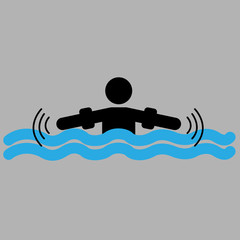 Person’s silhouette with water wings on waves