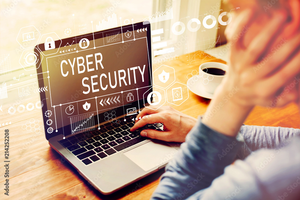 Poster cyber security with man using a laptop computer