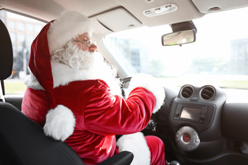Authentic Santa Claus driving car, view from inside