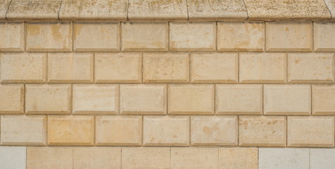 Stone wall texture for design. Part of the wall of the ancient castle as a texture.