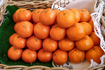 Fototapeta na wymiar Orange Mandarin Group in a basket