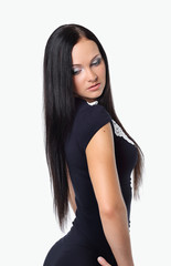 Fototapeta premium Woman holding hands behind head, isolated background