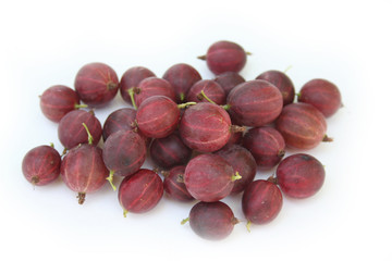 Ripe red gooseberries isolated on white background