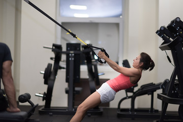 Middle aged woman in gym, health lifestyle, mature fit woman take exercises. Fitness woman workout in the gym. Fitness woman workout.