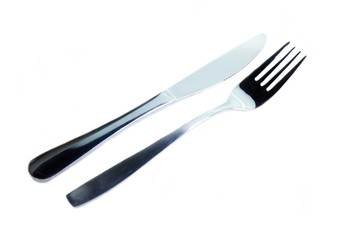 Metal fork and knife on a white background