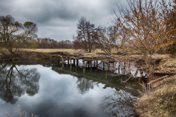 Old wooden abandoned bridge.