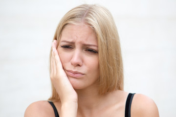 Fototapeta premium Woman with toothache outside