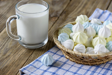 Rustic style. Breakfast with meringue and a cup of milk