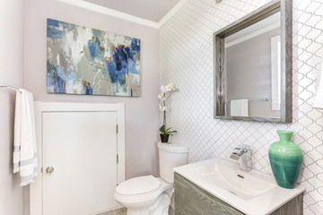 Naklejka na ściany i meble Well designed bathroom with mosaic tiled wall.