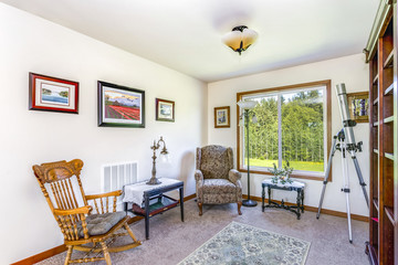 Second floor landing with cozy sitting area.