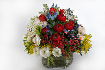 romantic bouquet in a vase on a light background