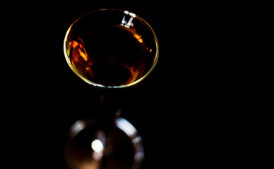 refreshing liqueur in a tall glass, alcoholic drink prepared by the bartender