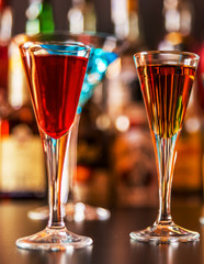 refreshing liqueur in a tall glass, alcoholic drink prepared by the bartender