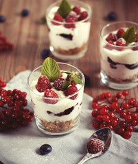 Healthy breakfast with yogurt and granola. Top view. Close up.