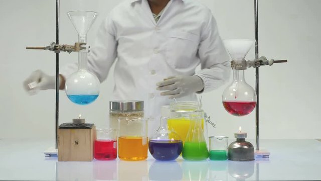 a scientist testing in laboratory experiments in chemical blending