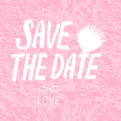 SAVE THE DATE card. Vector inscription lettering calligraphy white isolated on pink textured background.