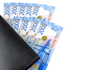 Russian cash. Banknotes in two thousand rubles. Black Man wallet. Payment