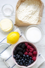 Raw ingredients for cooking berry pie, top view. From above, overhead, flat lay.