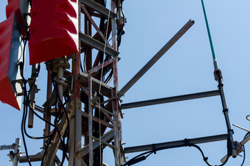 Telecommunication tower with antennas of cellular communication and radar systems