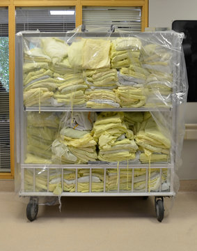 Stacks Of Hospital Laundry And  Linen Piled Up