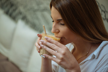 Young student enjoys a morning coffee