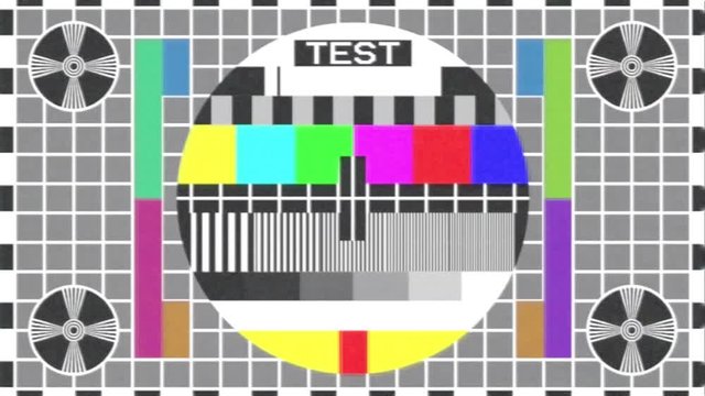 An old retro vintage tv test pattern (appearing on air in case of technical difficulties), with a heavy glitch effect.
