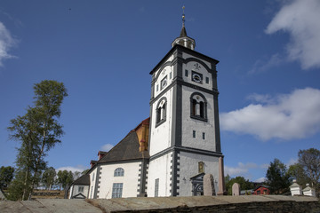Fototapeta na wymiar Church - Roeros area is well-known for its copper mines -Norway-Røros church, also known under the old name Bergstadens Ziir, is an elongated octagonal church from 1784