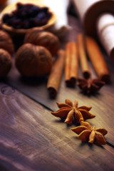 Anise stars, nuts, cinnamon, raisins for baking and cooking. Aromas of homemade food. Shallow depth of field.