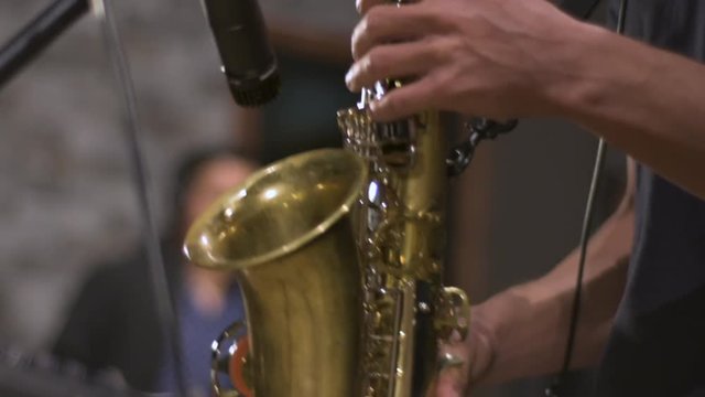Saxophone player jamming in slow motion.