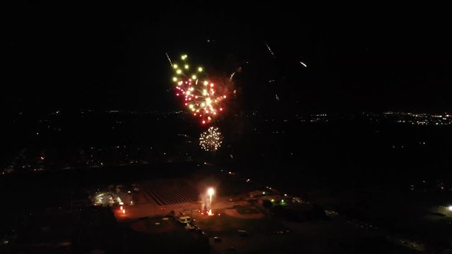 Small town fireworks finale above baseball field