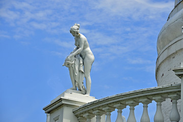 Vintage statue on top of tower