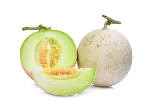 green cantaloupe melon isolated on white background