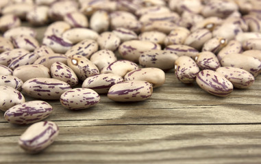 Haricot beans on wooden background, beans background