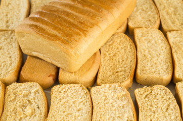 Sliced bread on the baking tray - Toast wheat bread sliced