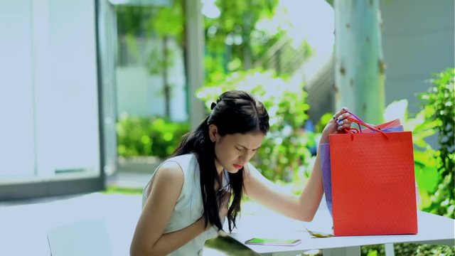 Young woman heart attack at the garden of mall