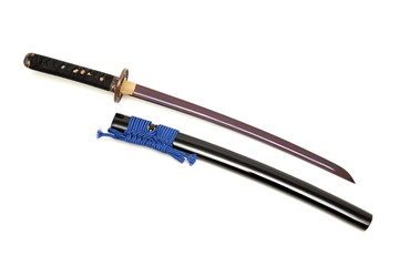 Japanese sword and scabbard on white background