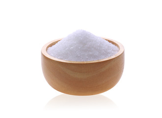 White sugar in a wooden cup isolated on white background.