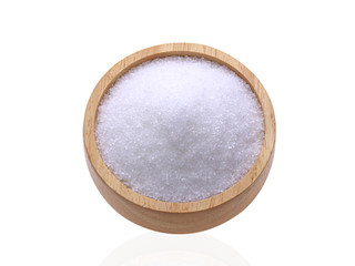 White sugar in a wooden cup isolated on white background.