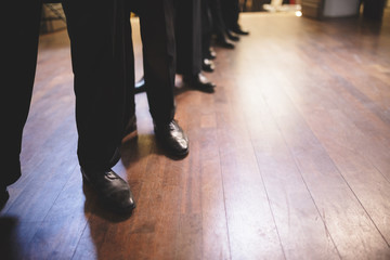 Legs of a dancing troop