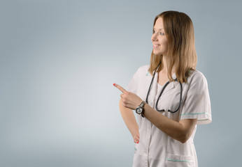 Woman doctor - on a gray background