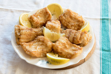 Breaded and fried Salted cod with lemon