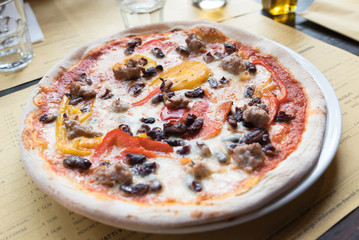 Neapolitan pizza sausage with peppers and mushrooms