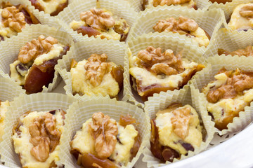 Dates with mascarpone cheese and walnuts