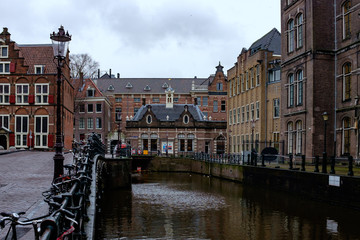 Fototapeta premium AMSTERDAM, NETHERLANDS Traditional old buildings 