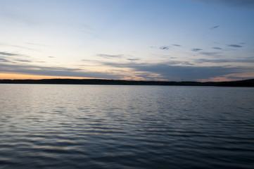 Fototapeta na wymiar Evening sky over the lake