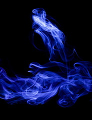 Blue smoke on black background