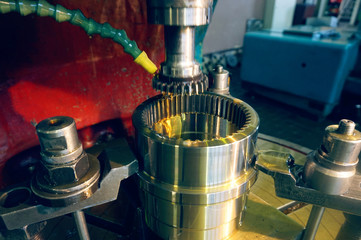 Gear cutter. Cutting the tooth on the tooth with a slotting machine with oil cooling. Metal-working industry.