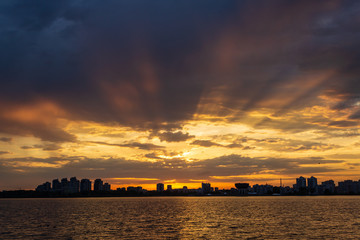 Fototapeta premium sunset over the river with divine rays