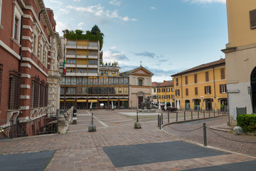 Historic center of Varese, Italy. Square Cacciatori delle Alpi with shops, bars and on the right...