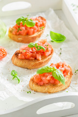Crisp and fresh bruschetta with tomato and basil